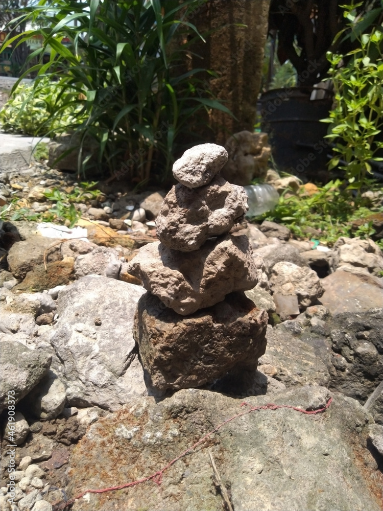 Rock Stack or Stone Balancing in the Garden Rock Stack or Stone Balancing in the Garden