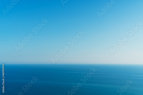 A perfect horizon between the blue sky and the sea.