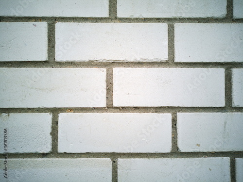 Light background. White brick wall.