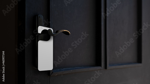 Door knob with blank door hanger mock up photo
