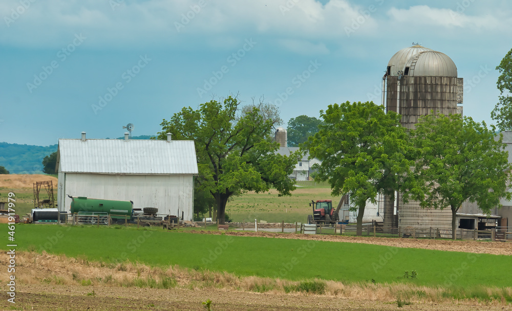 View of Farm Countryside With Blue Sky and White Clouds on a Spring Day View of Farm Countryside With Blue Sky and White Clouds on a Spring Day