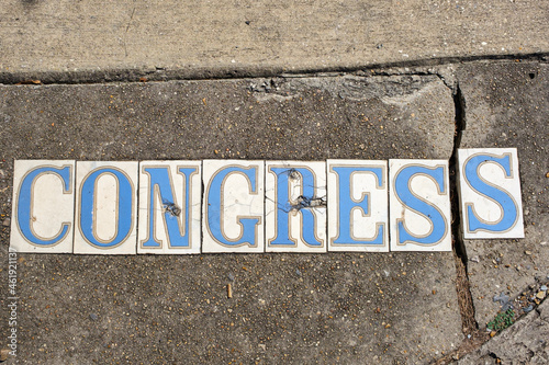Traditional Congress Street Tile Inlay on Sidewalk in New Orleans, Louisiana, USA 