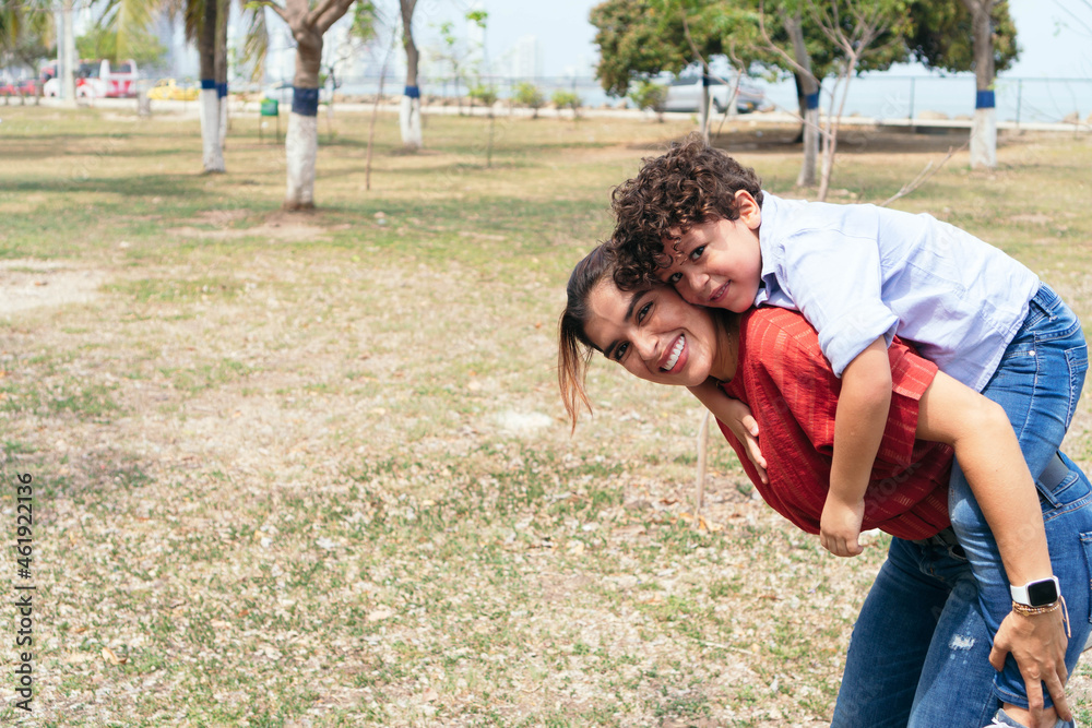 mother happy with her son outdoors
