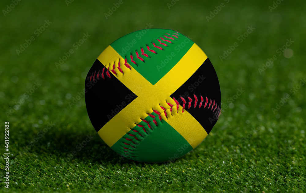 Baseball with Jamaica flag on green grass background, close up Baseball with Jamaica flag on green grass background, close up