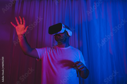 A young man who discovers new worlds by wearing augmented reality glasses for the world of the metaverse.