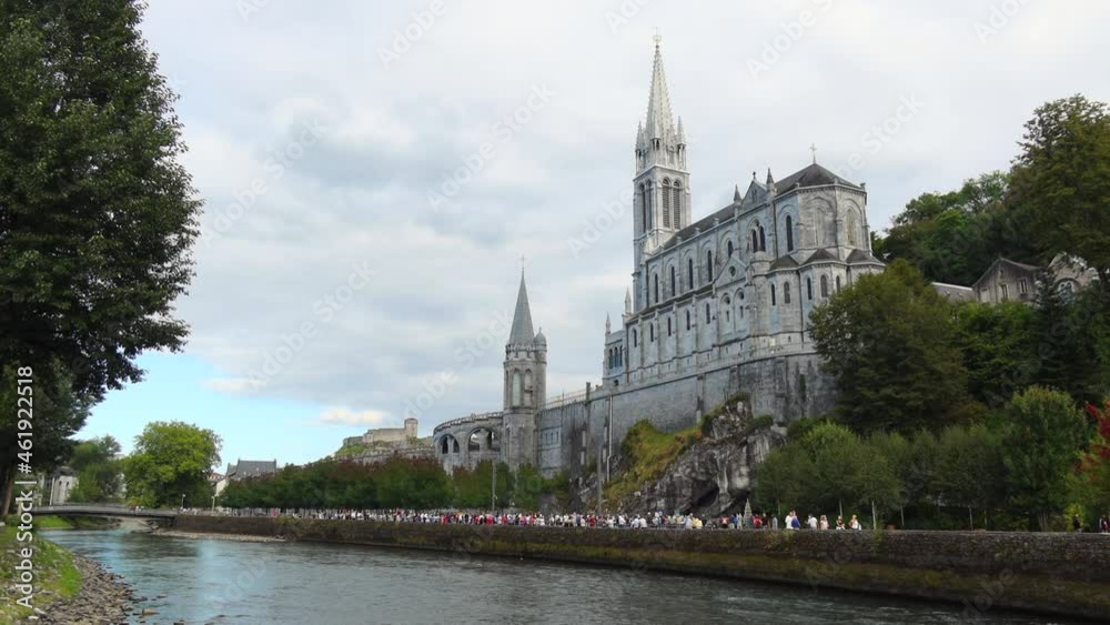 Lourdes, France - August 28, 2021: Sanctuary of our lady of Lourdes, a famous pilgrimage place, world known due to Marian apparitions Lourdes, France - August 28, 2021: Sanctuary of our lady of Lourdes, a famous pilgrimage place, world known due to Marian apparitions