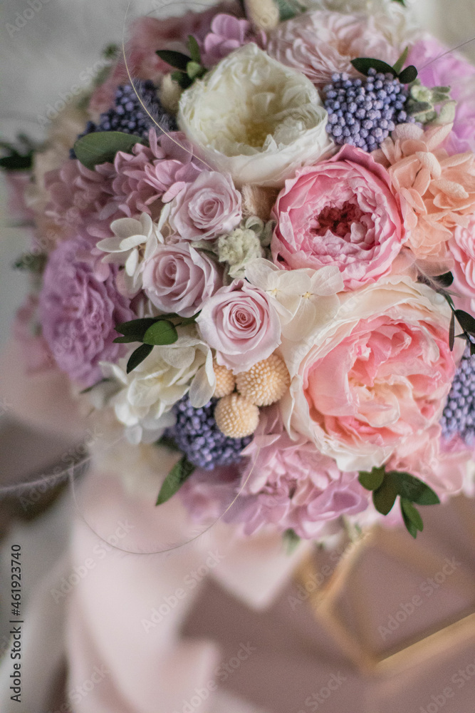 Stylish bridal bouquet of preserved flowers. Wedding bouquet of white and pink roses. Close up of wedding bouquet. Stylish bridal bouquet of preserved flowers. Wedding bouquet of white and pink roses. Close up of wedding bouquet.