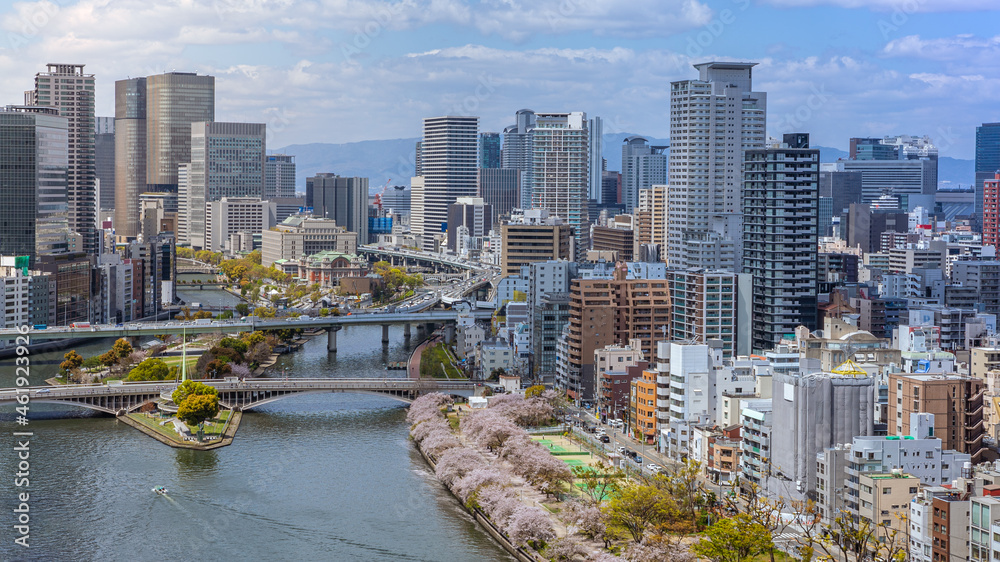 Naklejka premium Aerial view of Osaka city from sky building. Bird eye view of cityscape at Japan