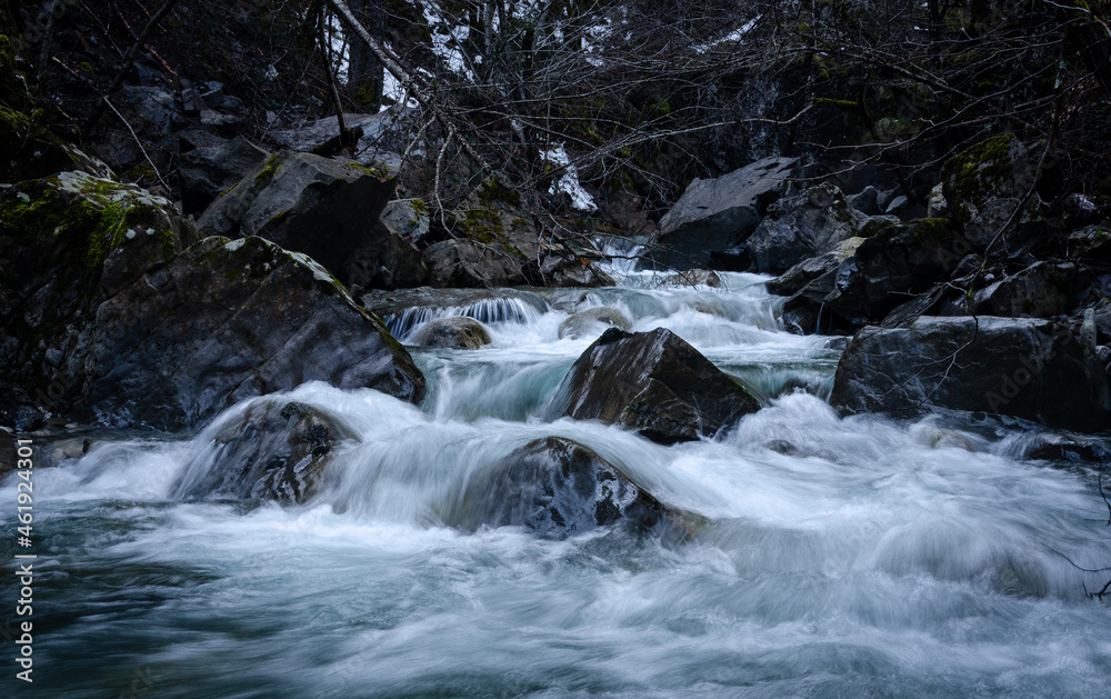 River next to waterfalls of Iliochori in Epirus region of Greece River next to waterfalls of Iliochori in Epirus region of Greece
