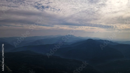 Mountain range, aerial, cliffs, sun rays, clouds, morning © Alex