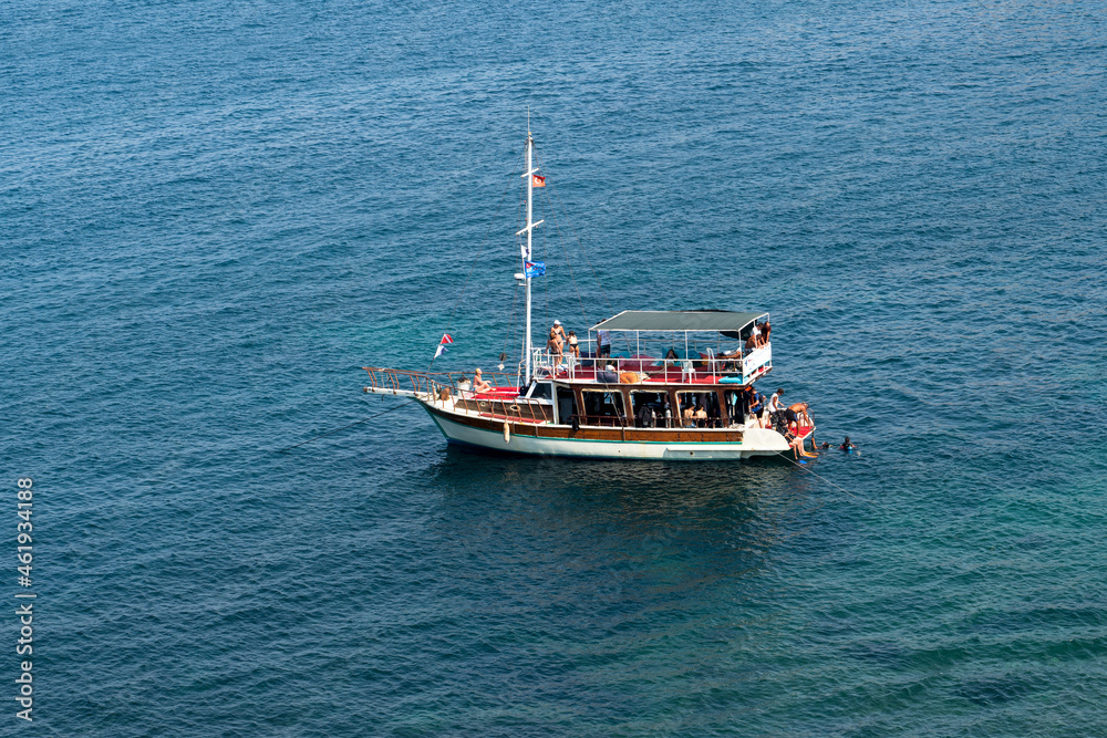 Kusadasi, Aydin, Turkey - August 23, 2021:Boat carrying scuba divers for touristic purposes.