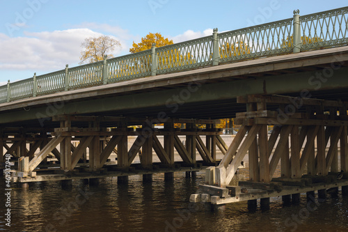 The wooden base of the Ioannovsky bridge. Saint-Petersburg, Russia. photo