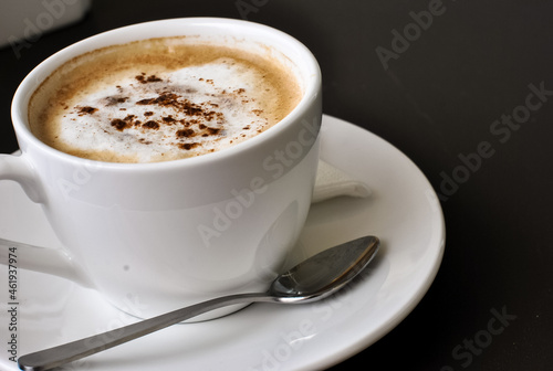 a cup of capucino coffee