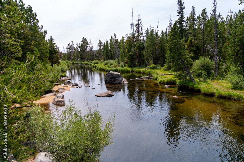 Little Popo Agie River, near Lander, Wyoming, with calm water Little Popo Agie River, near Lander, Wyoming, with calm water