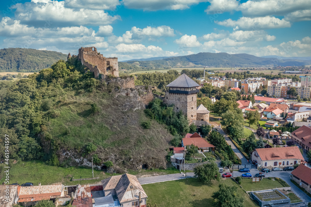 Aerial view of partially restored medieval Filakovo Fulek castle in Southern Slovakia with cannon bastion