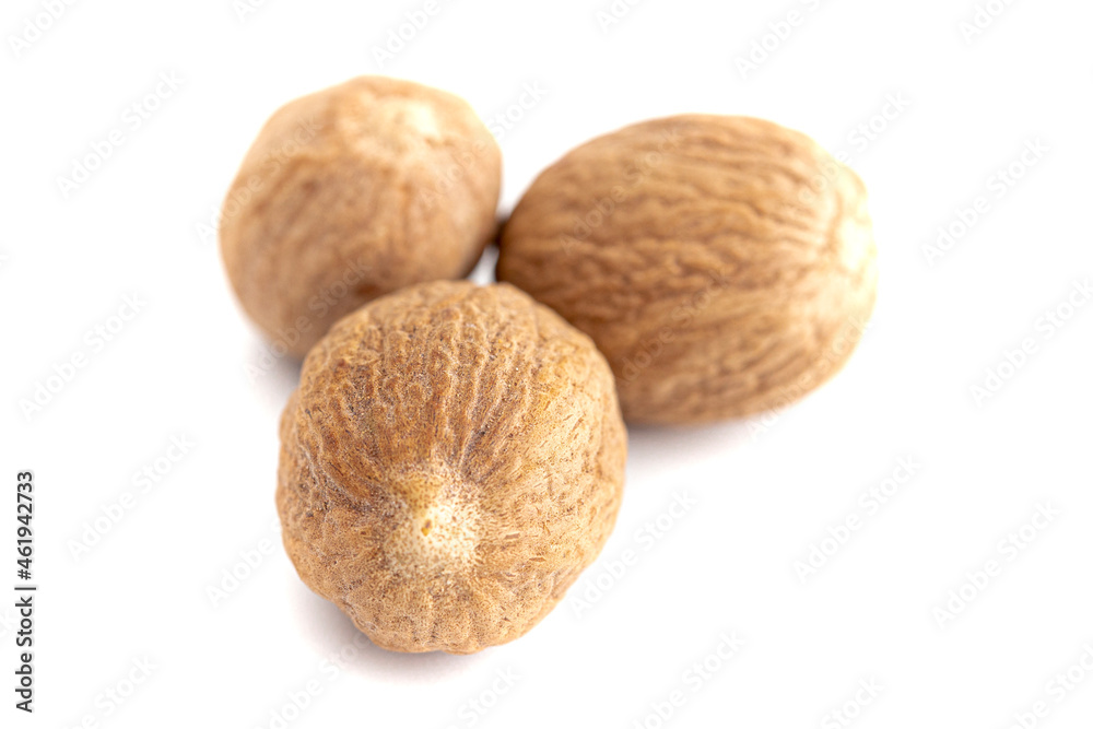 Whole Nutmeg on a White Background Whole Nutmeg on a White Background