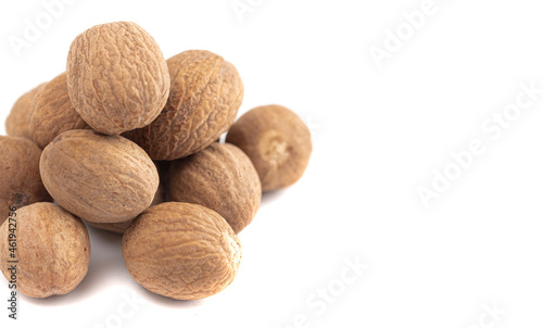 Whole Nutmeg on a White Background