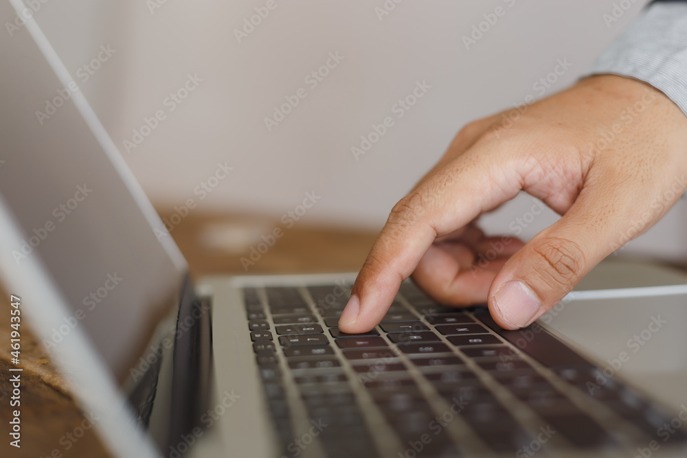 Close up hand of businessman working computer laptop at office. Male freelancer typing on the computer. Close up hand of businessman working computer laptop at office. Male freelancer typing on the computer.