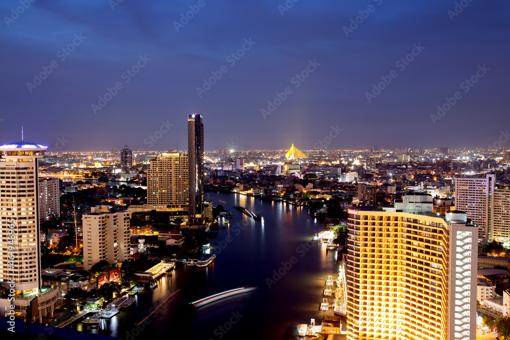 Bangkok THAILAND - July 11 2020 : View landscape of Bangkok tower with river in the evening, downtown and  cityscape in twilight at Thailand, skyscraper and condominium.