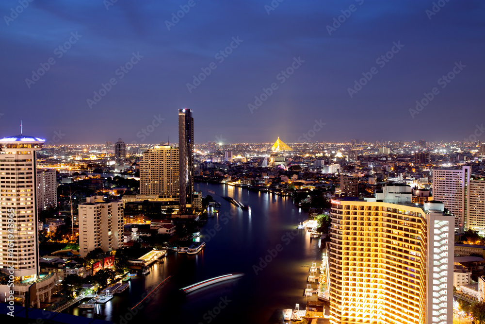 Fototapeta premium Bangkok THAILAND - July 11 2020 : View landscape of Bangkok tower with river in the evening, downtown and cityscape in twilight at Thailand, skyscraper and condominium.