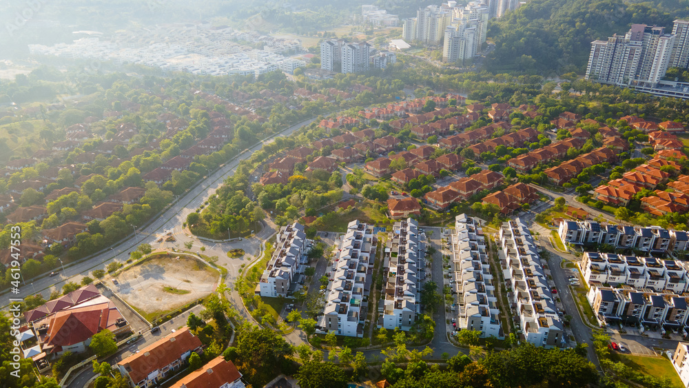 An aerial top down view of luxury residential neighbourhood during sunrise