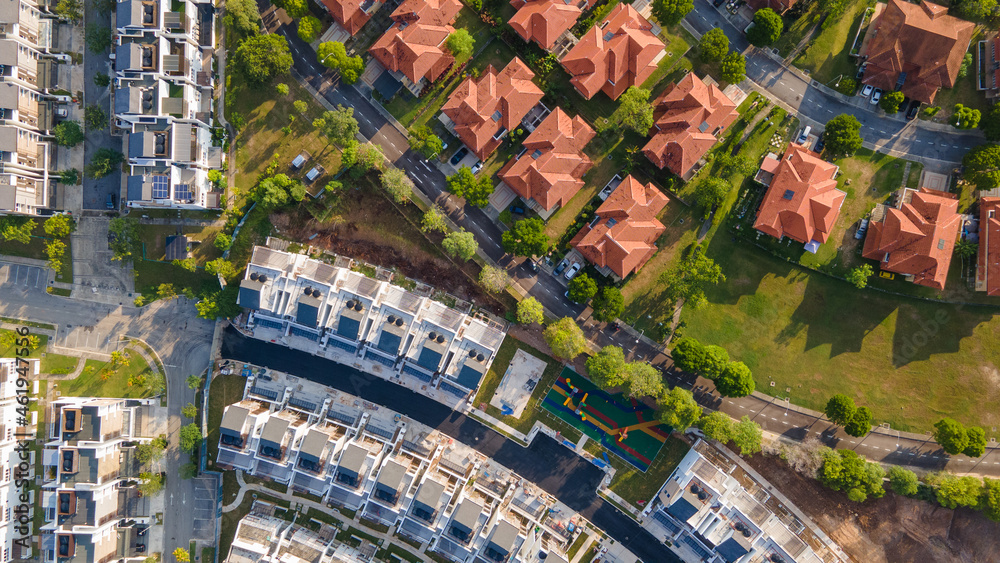 Fototapeta premium An aerial top down view of luxury residential neighbourhood during sunrise