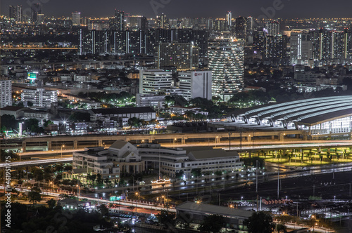 Bangkok, thailand - Aug 28, 2020 : Aerial view of Bang Sue central station with skyscrapers background at night. Selective focus.