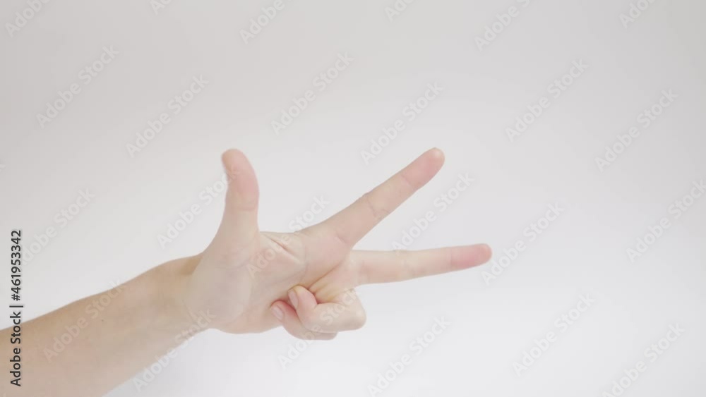 Close-up, Women's Hand shows class and counts up to three on the fingers on a white background.