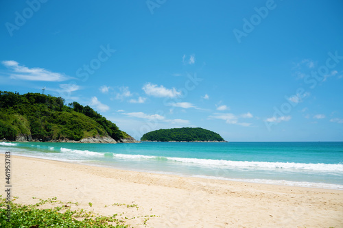 Beautiful sea middle two mountains blue sky background.Landscape view beach sea and sand on summer. © loveyousomuch