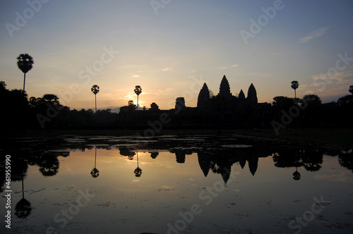 Ancient ruins antique building castle Khmer Empire of Angkor Wat city temple for cambodian people foreign travelers travel visit respect praying and looking landscape sunrise in Siem Reap, Cambodia