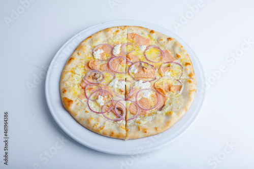 italian pizza on white plate and white plate