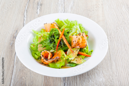salad with salmon herbs in sweet sauce