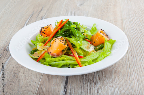 salad with salmon herbs in sweet sauce