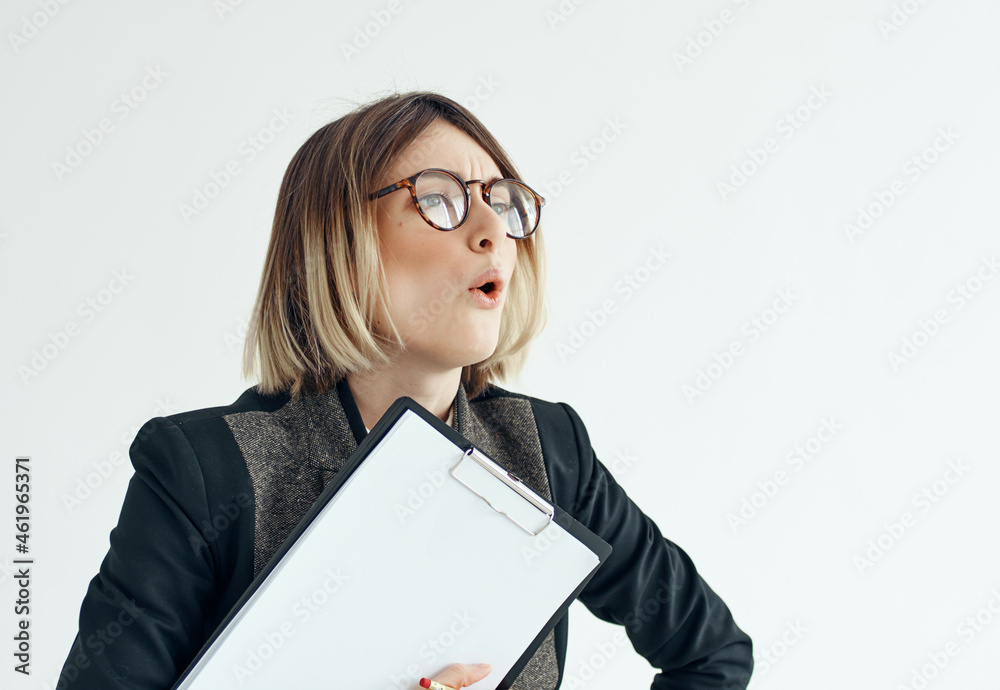 woman in glasses with folder in hands blank sheet studio office woman in glasses with folder in hands blank sheet studio office