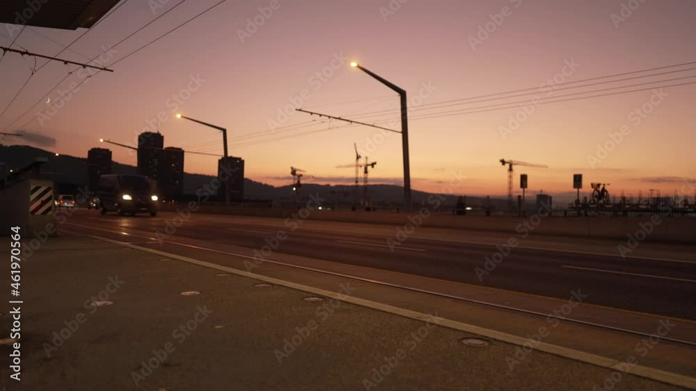 Traffic at Hard Bridge at autumn sunset. Movie shot October 9th, 2021, Zurich, Switzerland.