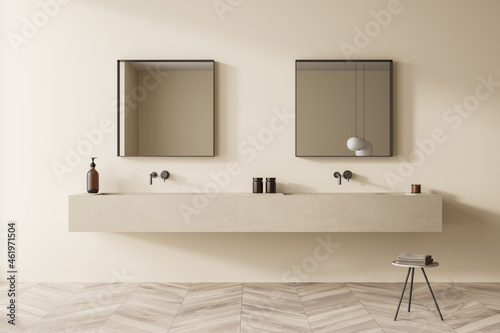 Beige bathroom vanity with square mirrors and stool