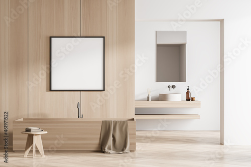 Square frame on wall of wood look bathroom with rectangular details