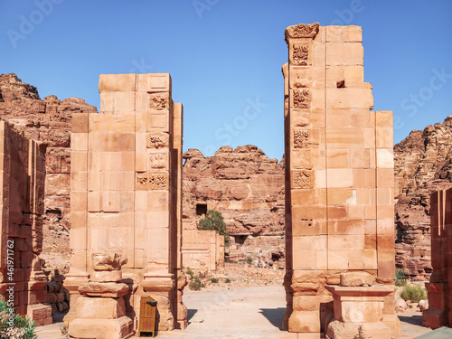 The temenos gate at the end of The Colonnaded Street in the ancient city of Petra, Jordan. photo