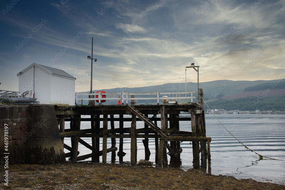 Abandoned old Victorian wooden pier building at Dunoon