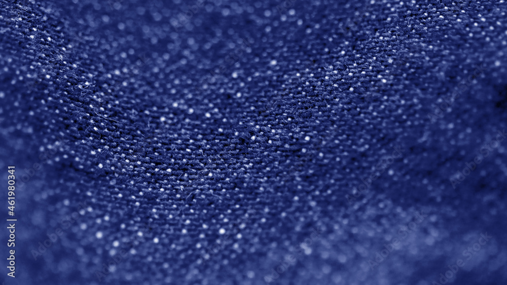 Blue fabric textile texture close up , focus only one point , soft blured background Blue fabric textile texture close up , focus only one point , soft blured background