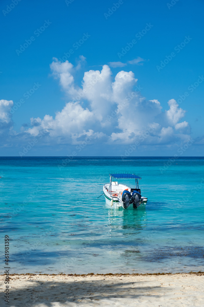 Boat in the blue Caribbean sea.