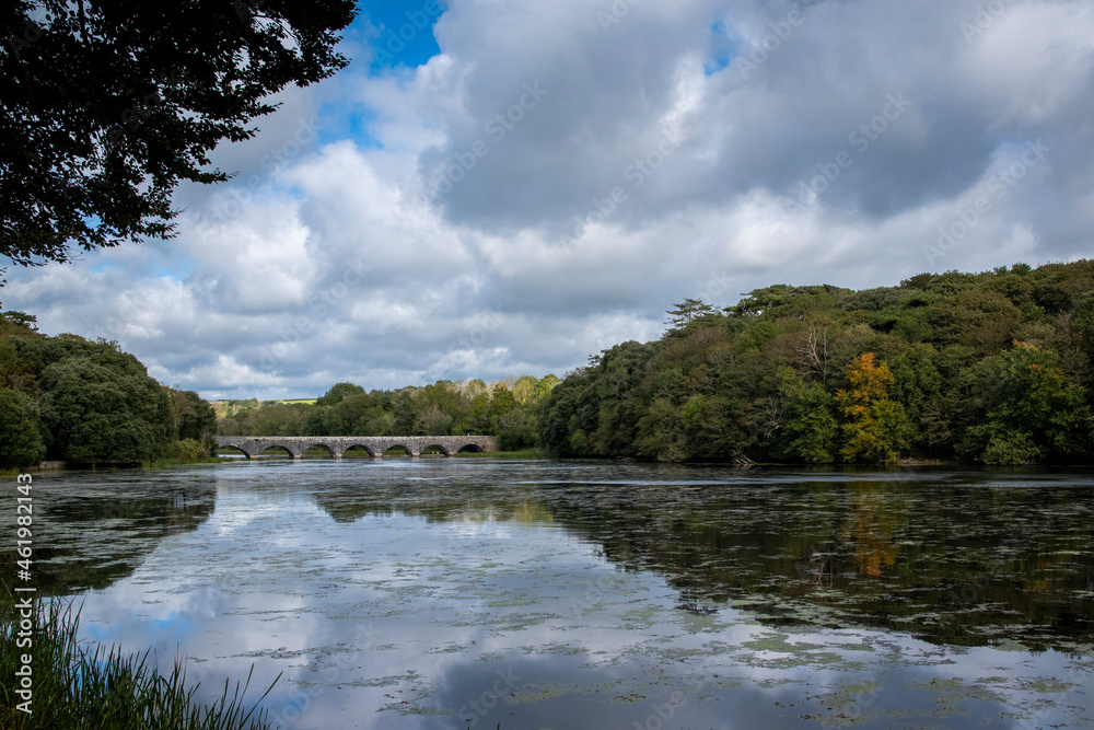 a side view of the eight arch bridge at bosherston lily ponds