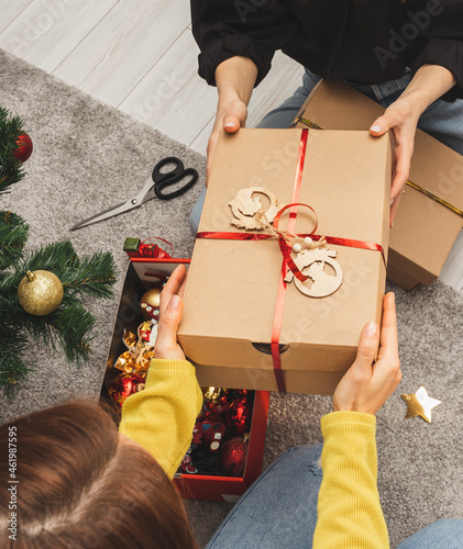 Принти на полотні Christmas gift made from cardboard shoebox, zero waste in Christmas time