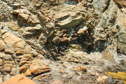 Rough rocky mountain texture. Sedimentary rock texture