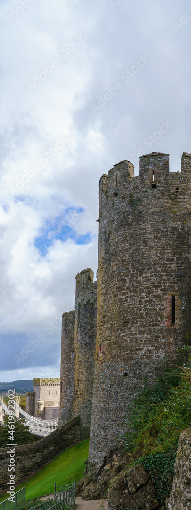external walls of the well preserved 13th century medieval Conwy castle, an imposing fortress in North Wales