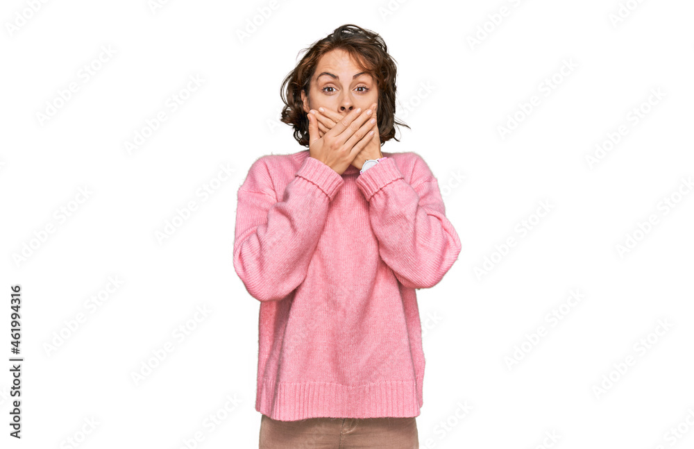 Young hispanic woman wearing casual clothes shocked covering mouth with hands for mistake. secret concept. Young hispanic woman wearing casual clothes shocked covering mouth with hands for mistake. secret concept.