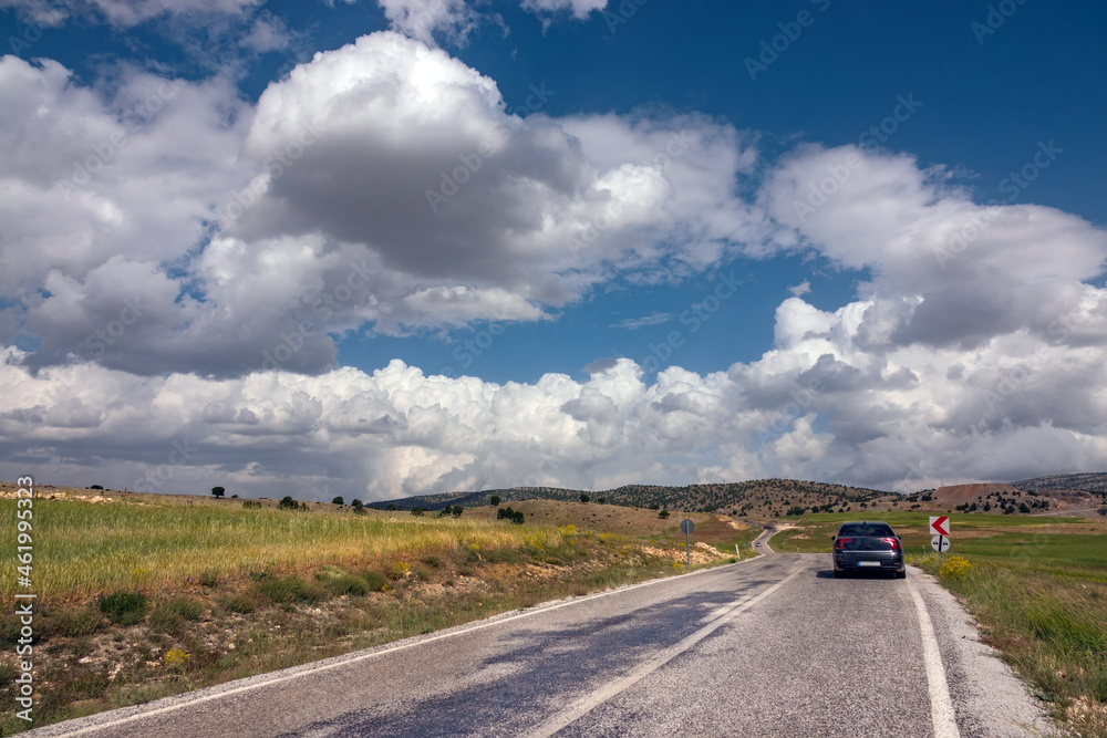 An asphalt road and wonderful sky in the high plains