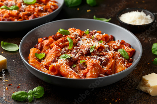 Traditional Italian Pasta e fagioli with bean, tomato and parmesan cheese