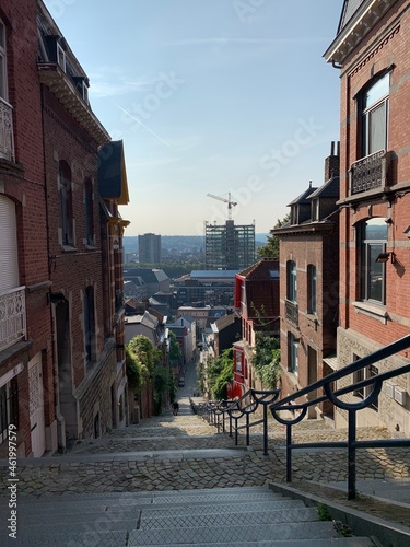 Skyline of Liege city. View from the top of Montagne de Bueren staircase. It is a famous sightseeing and tourists attraction place. Liege, Wallonia, Belgium © Lukas