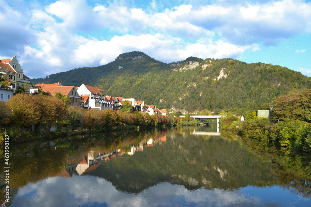 Fronleiten, a beautiful tourist town in Austria. Lake and mountains in the city in autumn.